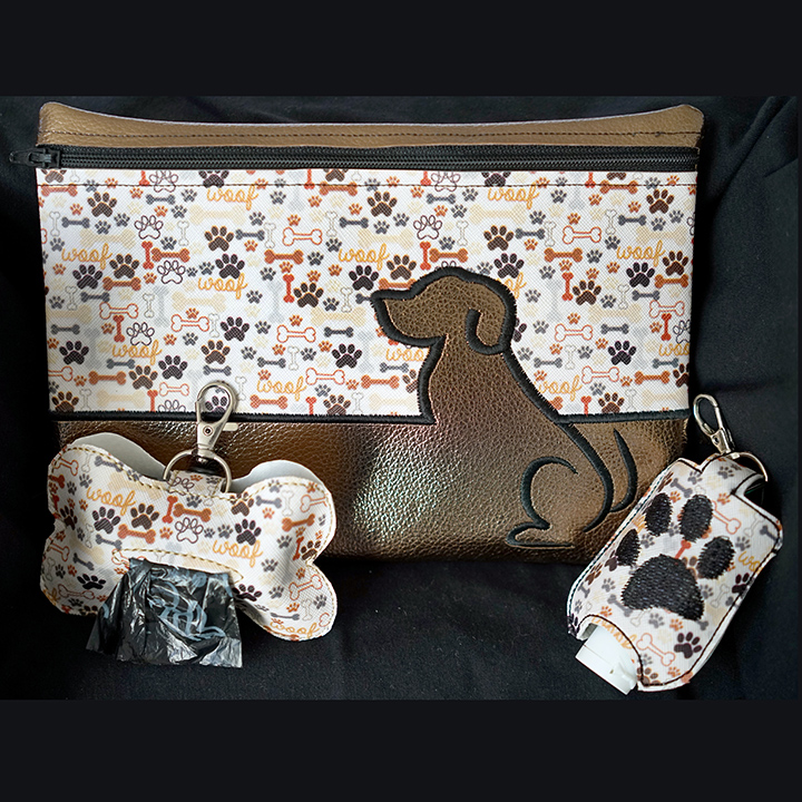 Dog purse with hand sianitzer and poop bag